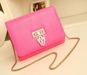 Candy-colored hollow skull evening bag